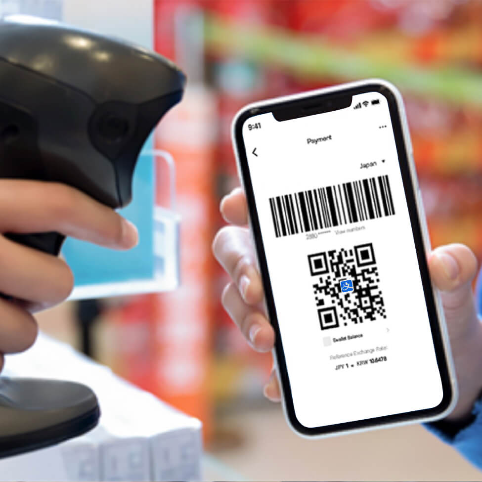The user shows the QR code to the vendor and has it scanned to make the payment